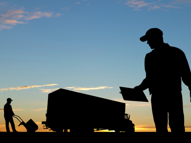 Night delivery with men and a truck Night delivery with men and a truck