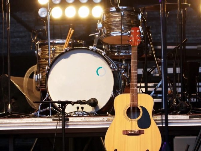 Stage with drums and guitar