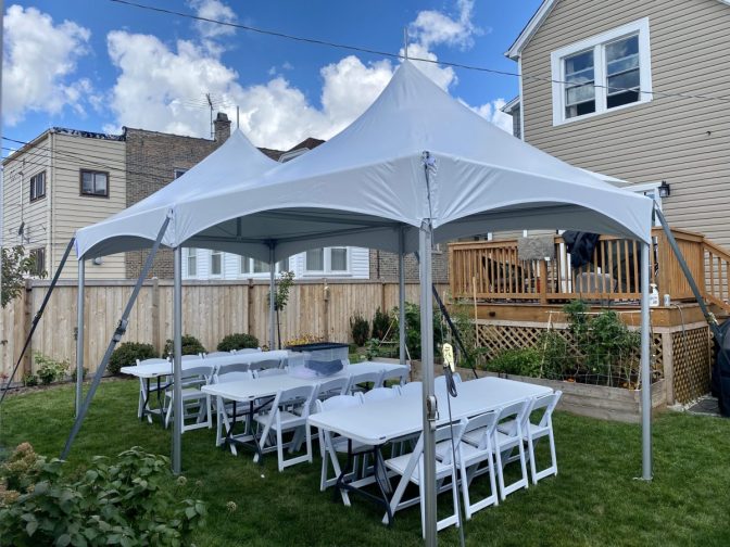 10x20 high peak tent with tables and chairs