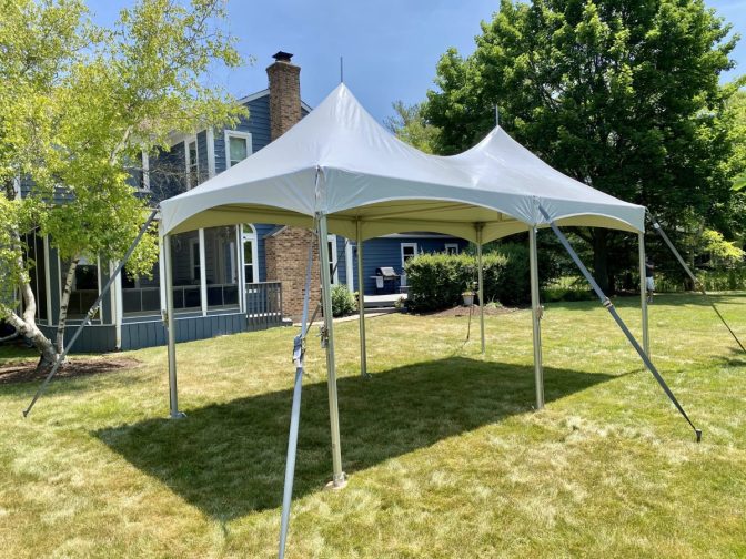 10x20 high peak tent in backyard